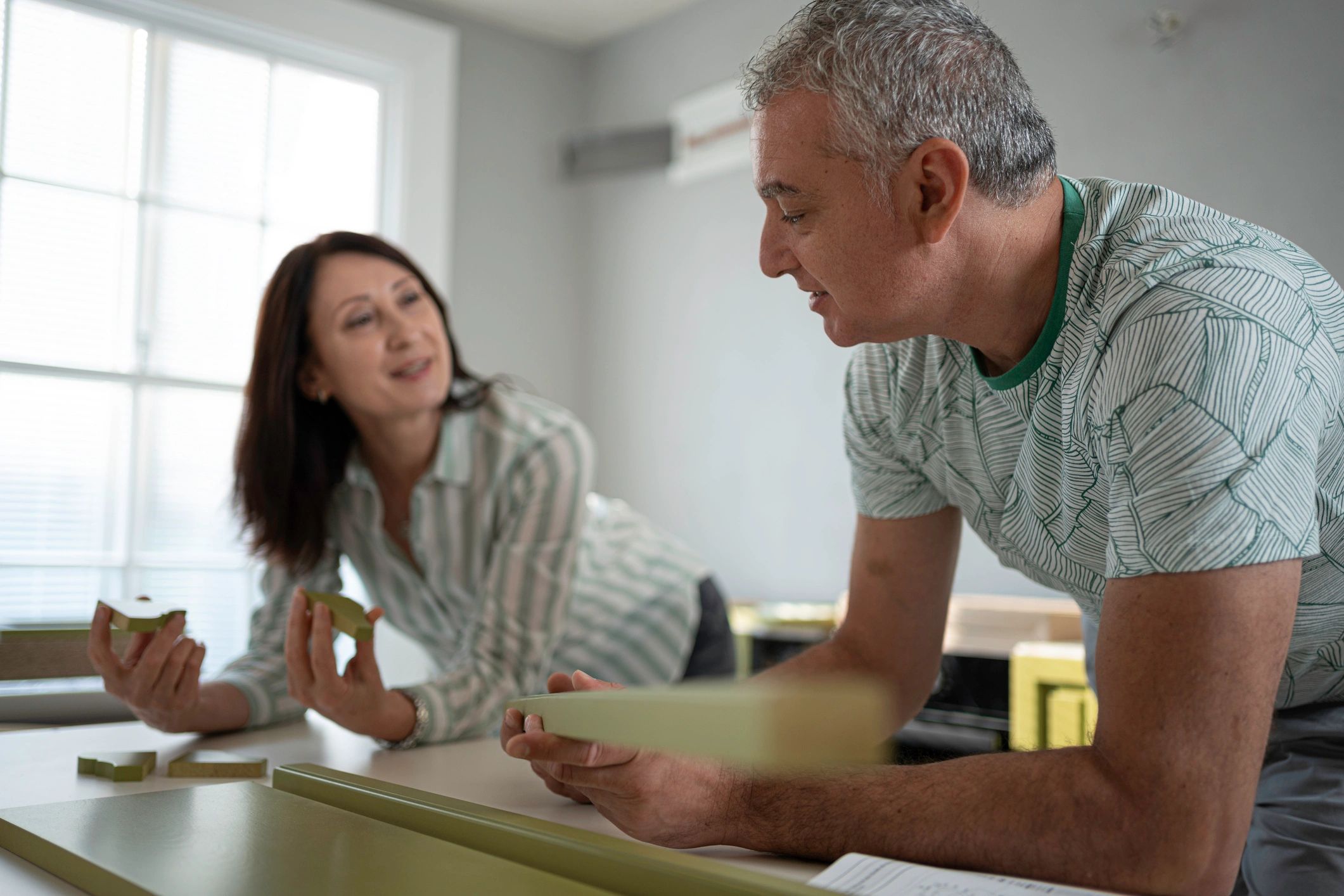 Homeowners in a kitchen during a remodel