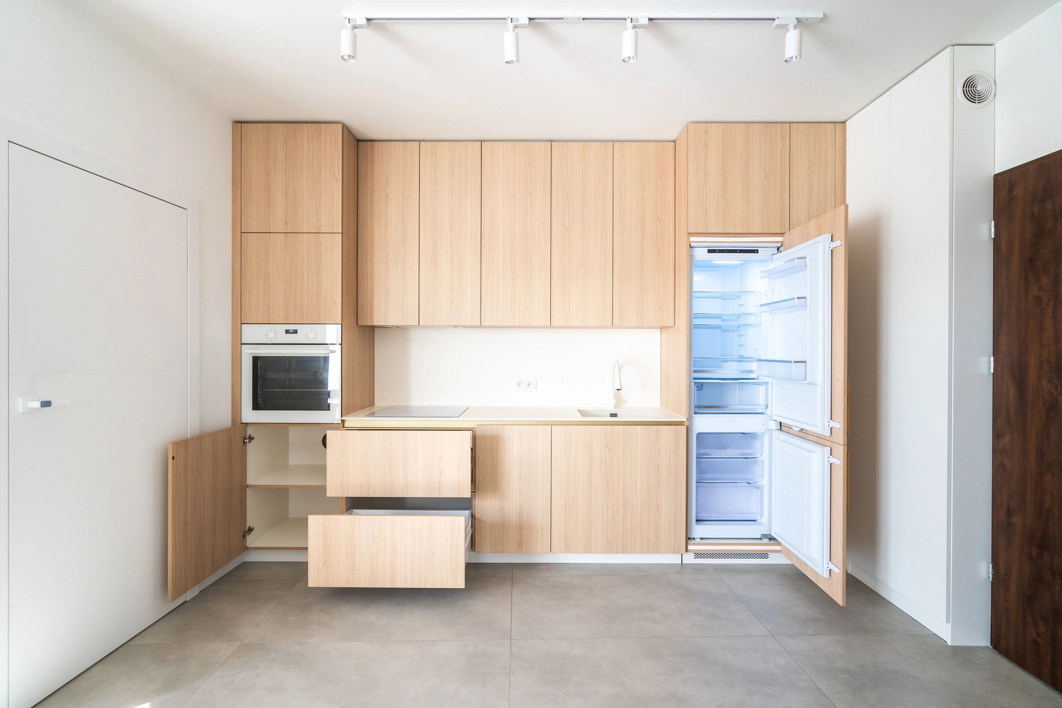 Modern minimalist wood kitchen cabinetry with clean lines