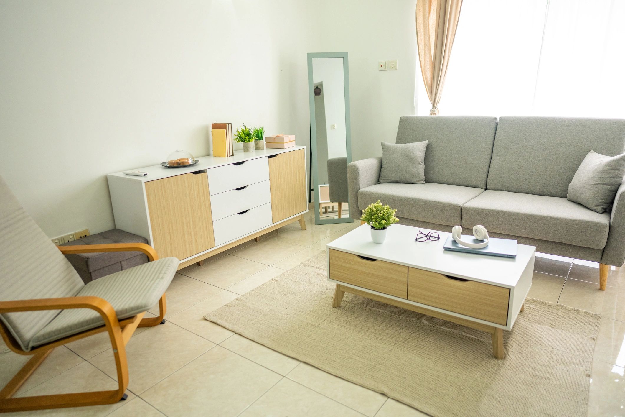 Bright living room with modern cabinetry and shelving