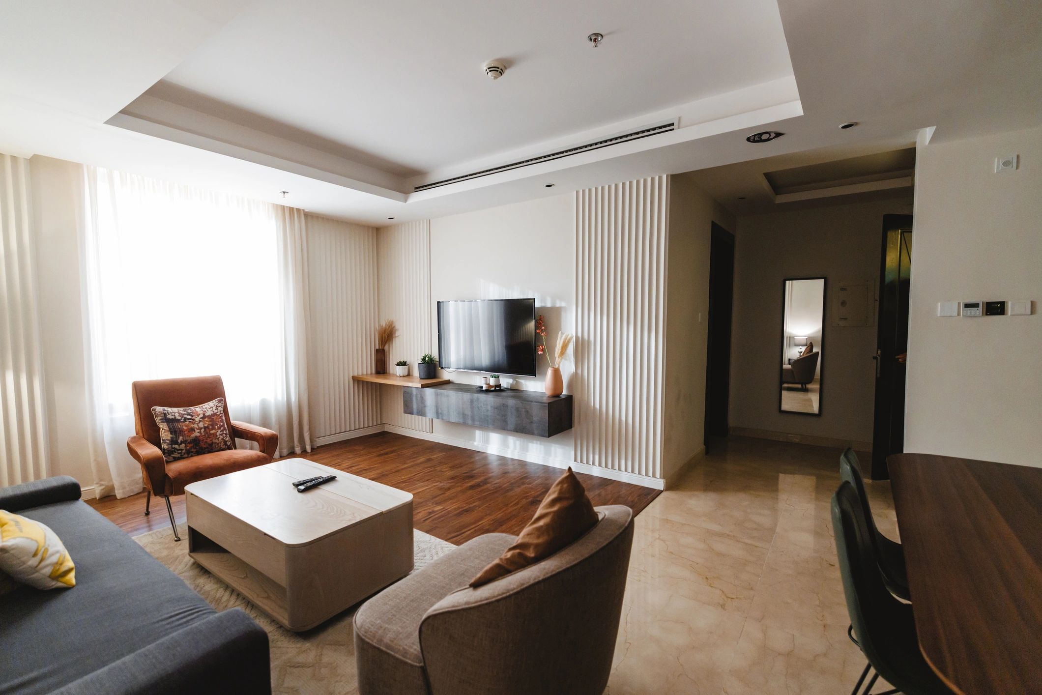 Modern interior with TV wall and integrated storage